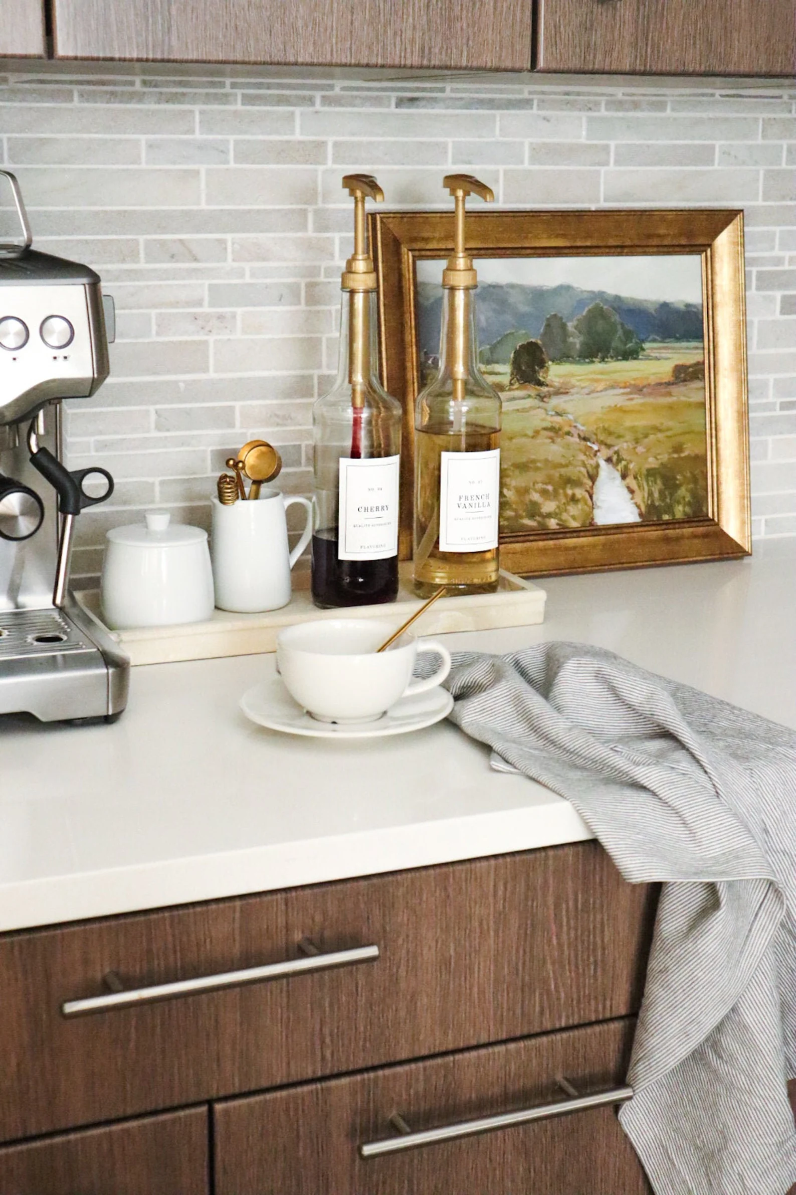22 Coffee Bar Ideas for Your Kitchen Counter That'll Make Every Sip Feel Special! - Sophisticated Coffee Bar with Glass Accents