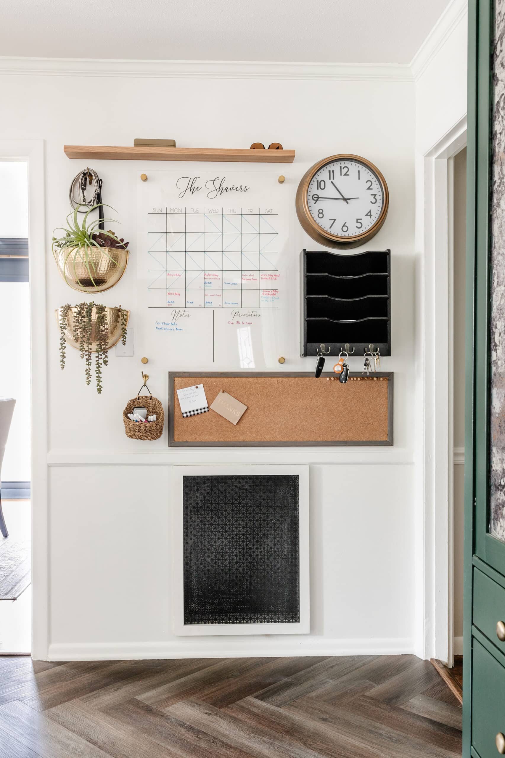 22 Chic Kitchen Command Center Designs for a Modern and Sleek Look! - 15. Bright & Functional Pegboard Setup