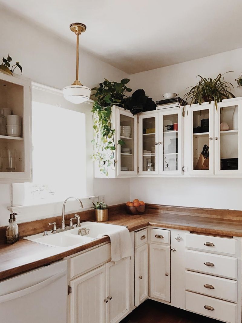 22 Style Tips for Decorating the Space Above Kitchen Cabinets Like a Pro (Don't Miss #11!) - 6. Add Seasonal Decor