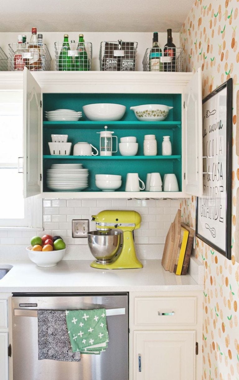 22 Style Tips for Decorating the Space Above Kitchen Cabinets Like a Pro (Don't Miss #11!) - 13. Use Colorful Decor